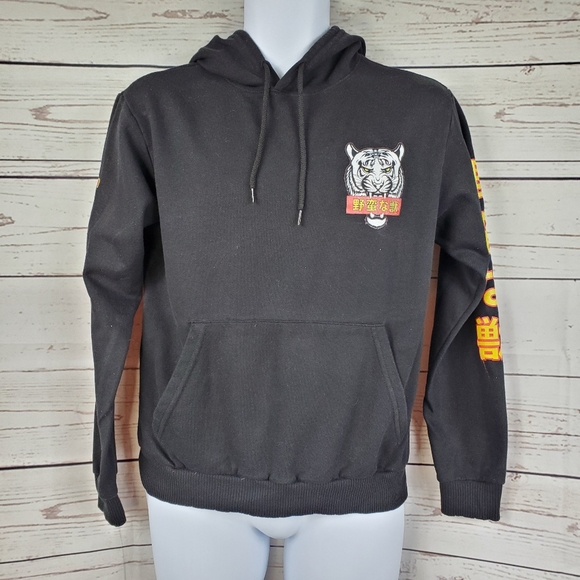 black hoodie yellow writing